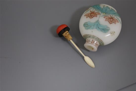 A Chinese enamelled Guyue Xuan glass lotus snuff bottle, possibly Palace workshops and Qianlong period, H. 5.3cm excluding stopper